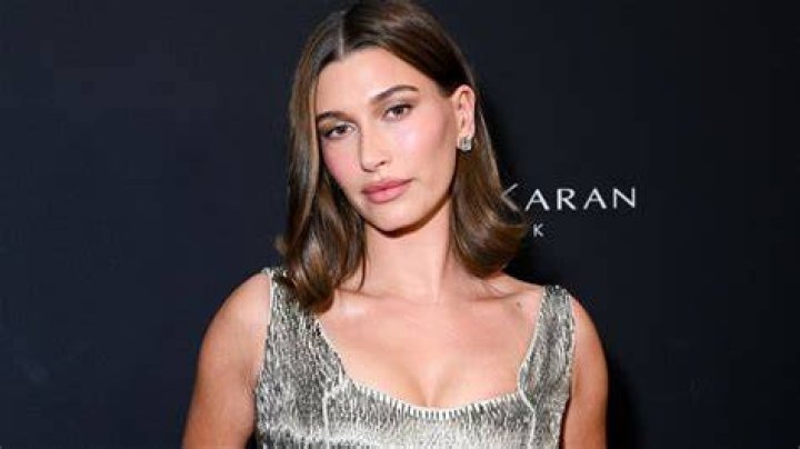 Hailey Bieber rocks a &rsquo;90sinspired look with a sheer slip dress and