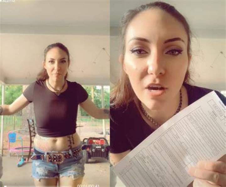 Indecent exposure: The woman was caught on camera by a passerby running down the road and past a McDonald's in New Orleans as a police cruiser trailed her&nbsp;