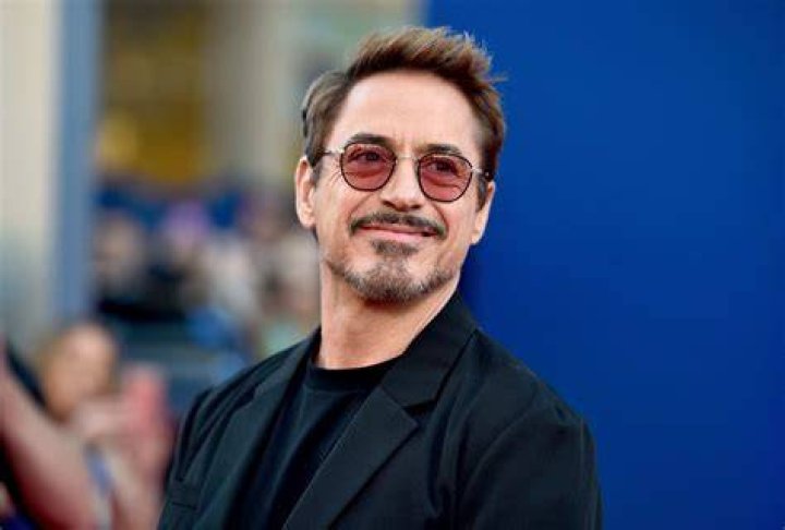 Robert Downey Jr lets his kids shave his head for a new project